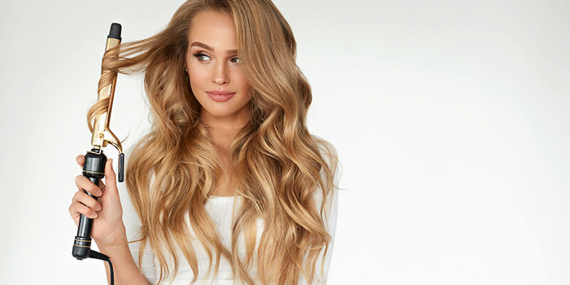 girl curling hair