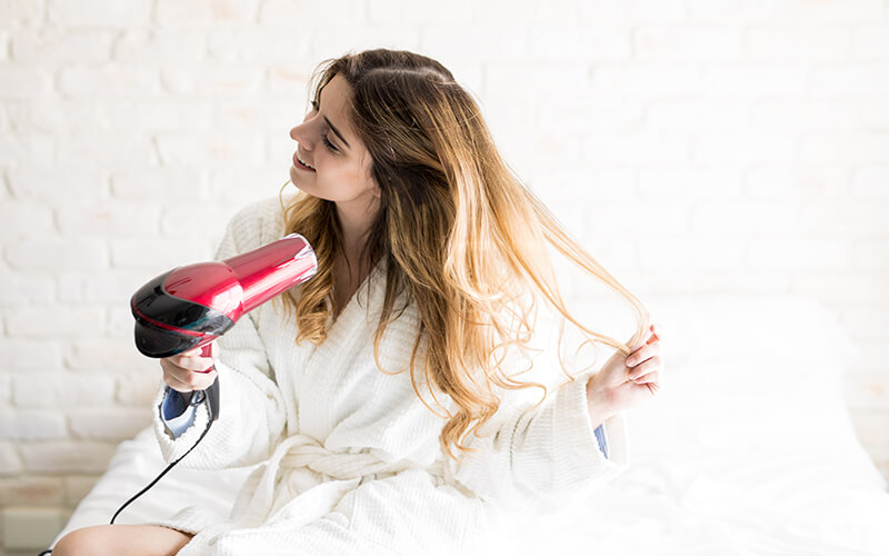 girl drying hair